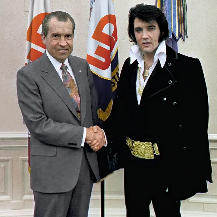 Colorized photo of Richard Nixon and Elvis Presley shaking hands with a Womp Designs logo on background flags.